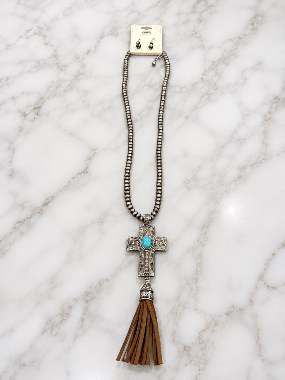 Silver Beaded Cross Pendant Necklace with Turquoise Accent & Brown Tassel